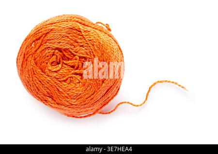 ball of orange threads on a white isolated background Stock Photo