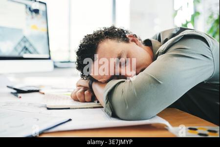 Engineering, fatigue and sleeping with architect at desk in office for project management or research. Asleep, construction and tired with exhausted Stock Photo