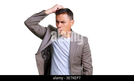Man scratching head looking confused and thinking, transparent background Stock Photo