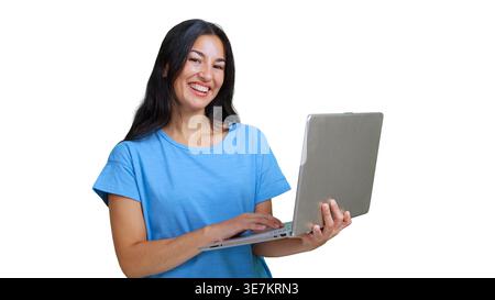 Cheerful young woman using laptop on transparent background Stock Photo