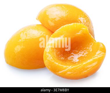 Peeled canned peach halves isolated on white background. File contains clipping paths. Stock Photo
