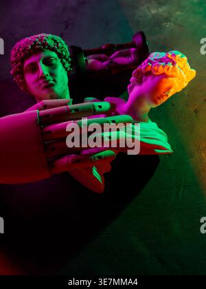 Robotic hand touching classical sculpture in neon lighting for artificial intelligence concept Stock Photo