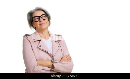 Mature woman wearing glasses looking up smiling cheerfully Stock Photo