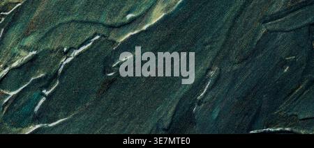 Abstract dark teal and gold paint texture with flowing organic brush strokes Stock Photo