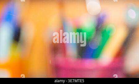 Colorful abstract blurred background with rainbow bokeh and vibrant multicolored light spots Stock Photo