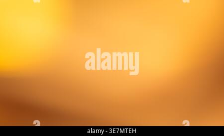 Smooth golden amber gradient abstract background with warm yellow and rich brown tones for design Stock Photo