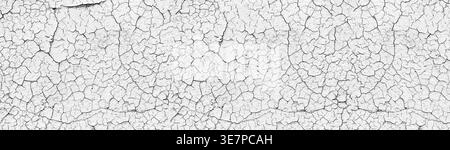 White cracked weathered concrete wall wide texture. Old cement light surface panorama. Retro panoramic background Stock Photo