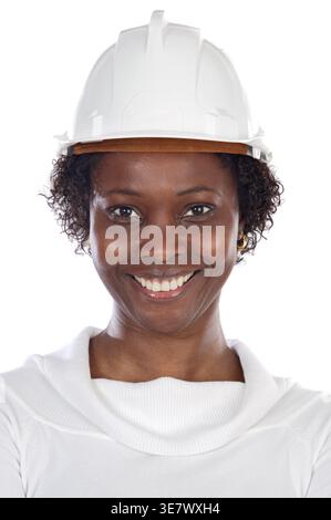 Smiling Black female wearing hard hat standing against white background Stock Photo