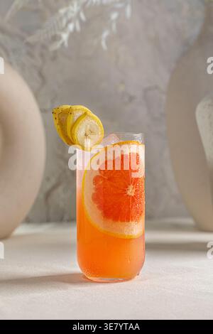 Grapefruit cocktail with citrus slices and ice Stock Photo