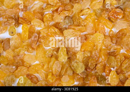 Sweet morning boost. Sundried sultanas add natural sweetness to bowls. Glowing golden raisins embellish cereals creating inviting morning servings Stock Photo