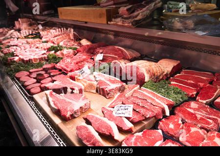 Fresh raw meat on display at a butcher stall in Borough Market Stock Photo
