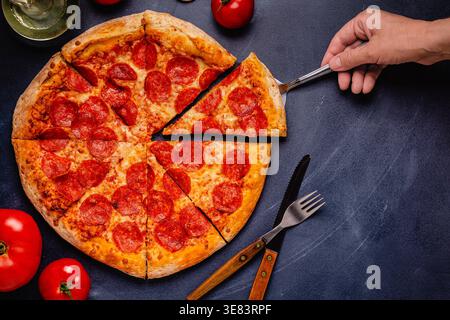 Hot homemade Pepperoni pizza, top view. Stock Photo