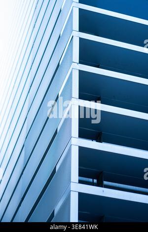 Modern building facade showcasing geometric lines, abstract patterns Stock Photo