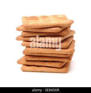 Stack of square wholegrain crackers isolated on white Stock Photo
