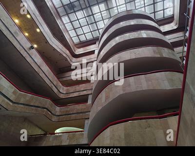 Spiral staircase. Interior Architecture library Building. Balcony indoor. Stairway Hall University. Inside classroom education study. Stock Photo