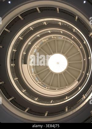 Interior view looking upward through the dome of Iloilo Provincial Capitol building, showcasing concentric circular architectural layers, ornate detai Stock Photo