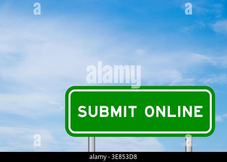 Green color transportation sign with word submit online on blue sky with white cloud background Stock Photo