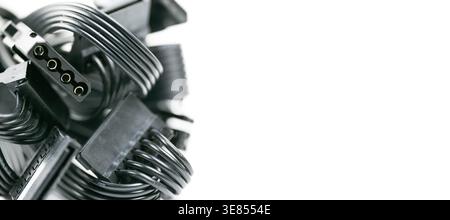 Close-up of black internal PC power cables and connectors isolated on a white background Stock Photo