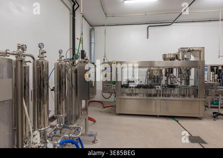 Stainless steel equipment and automated production line in a clean manufacturing facility Stock Photo
