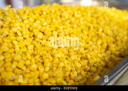 Close Up of Fresh Sweet Corn Kernels in Metal Tray. High quality photo Stock Photo