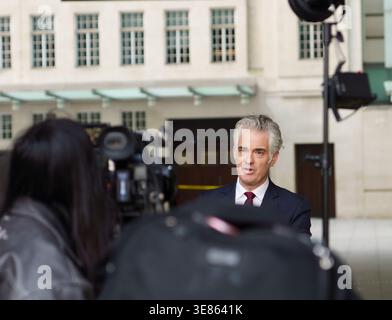BBC Portland Place, London, UK April 12th 2026.  Rt hon james cartlidge, shadow secretary for defence, being interviewed by a news crew outside the BBC in London, with cameras and media equipment set up for a broadcast. Bridget Catterall 17�Թ�����LiveNews Stock Photo