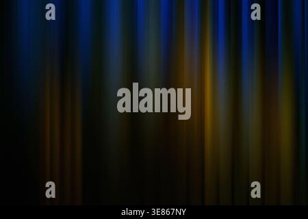 An abstract image featuring vertical lines in a captivating blend of blue and yellow hues. The design creates a surreal, modern aesthetic, ideal for b Stock Photo