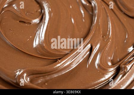 Creamy delicious chocolate melted cream texture background Stock Photo