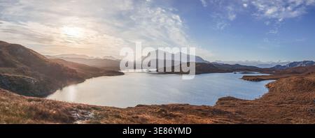 Panoramic view looking south-east over Loch Kernsary shortly after sunrise, Scottish Highlands, Scotland, UK Stock Photo
