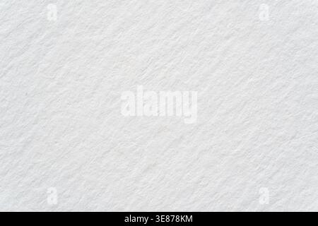 Seamless white watercolor paper background texture. Tileable thick rough kraft card stock flat lay backdrop pattern with copy space. High resolution a Stock Photo