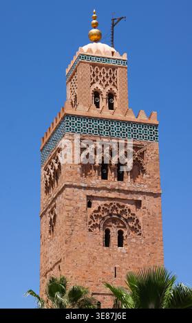 Close up striking image of the Minaret of the Koutoubia Mosque in Marrakech against a clear deep blue sky background Stock Photo