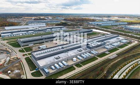 Large AI data center campus with multiple buildings and cooling units Stock Photo