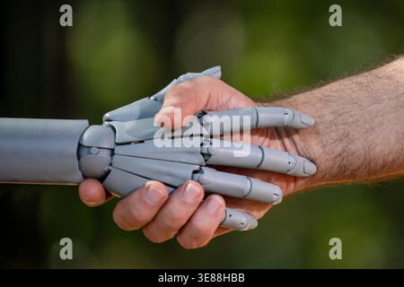 Robot and human hands in technology future. Robotic hands with human innovation. Robot hands on digital intelligence. Human hands with robot ai. Stock Photo