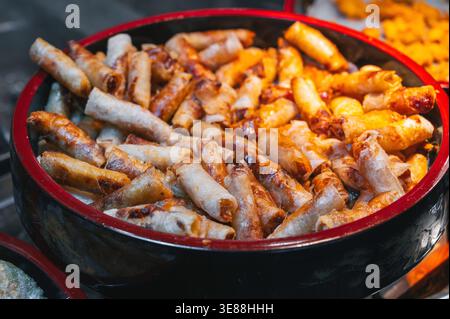 Deep-fried spring roll is a well-known and delicious traditional type of dish in Vietnam. Stock Photo