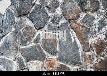 Wall or floor cladding with uneven stone slab texture Stock Photo