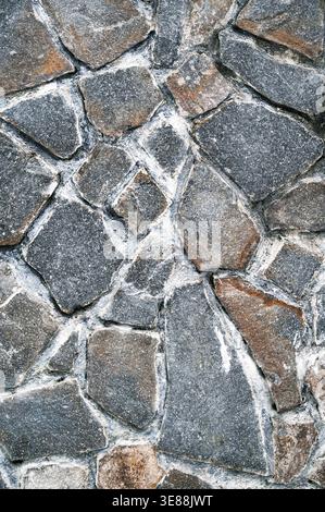 Wall or floor cladding with uneven stone slab texture Stock Photo