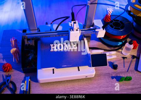 3D Printer Creating HOME Letters Stock Photo