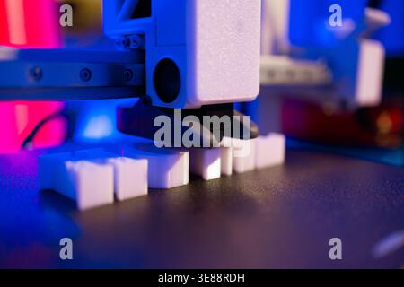 3D Printer Creating White Objects Stock Photo
