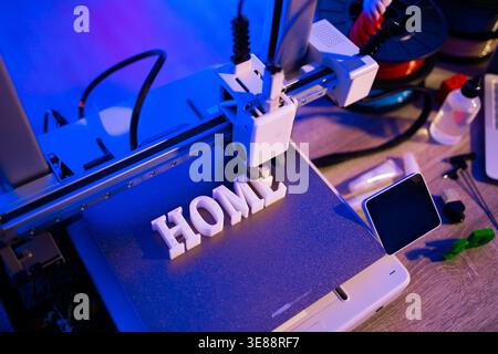 3D Printer Creating Word HOME Stock Photo