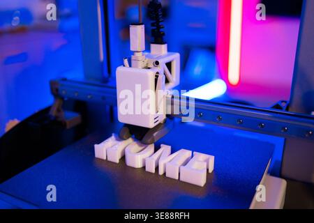 3D Printer Creating Word HOME Stock Photo