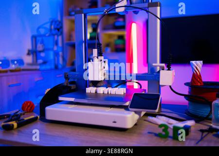 3D Printer Creating Objects Stock Photo