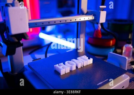 3D Printer Creating Word HOME Stock Photo