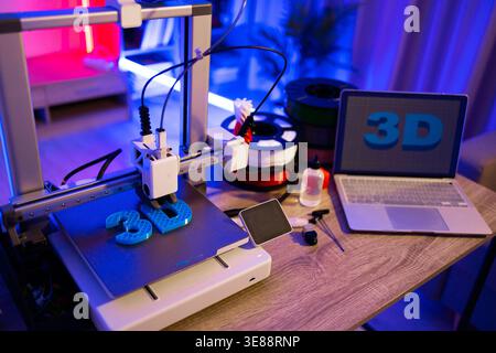 3D Printer Creating Objects Stock Photo