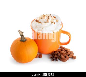 Mug of pumpkin latte with whipped cream and almond on white background Stock Photo