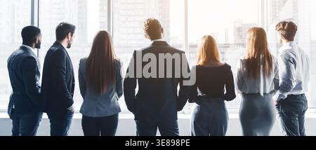 Business team having break at meeting, back view Stock Photo
