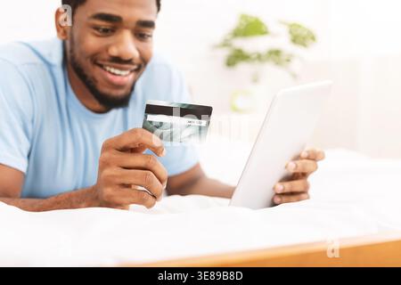 Man check credit card balance via online application Stock Photo