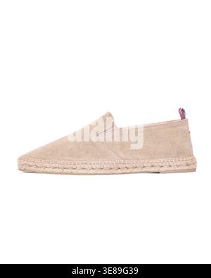 Beige canvas espadrille shoe side view isolated on white Stock Photo