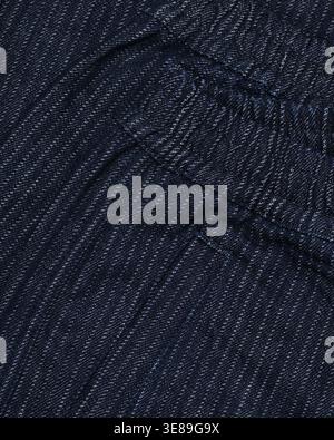 Dark blue fabric texture with stitching and elastic waistband detail Stock Photo