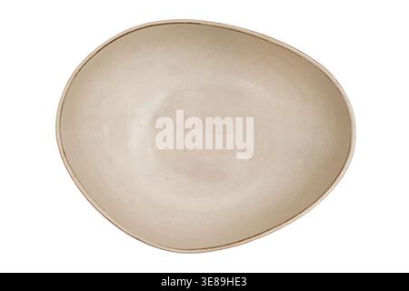 Empty white ceramic bowl with irregular shape. Minimalist kitchenware for food serving. Elegant rustic pottery dish isolated on white background. Hous Stock Photo
