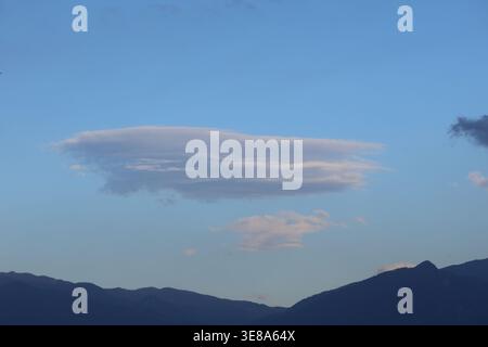 Rare Lenticular Cloud Formation in the sky Stock Photo