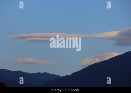 Rare Lenticular Cloud Formation in the sky Stock Photo
